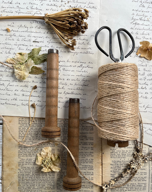 small vintage wooden bobbins